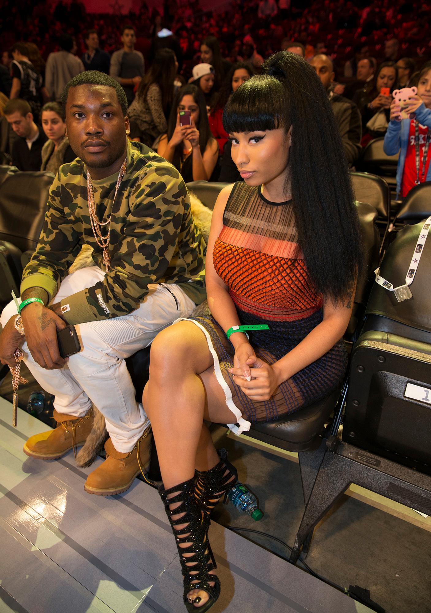 Nicki Minaj sits court side enjoying the NBA All Star Slam Dunk Contest at Barclays Center