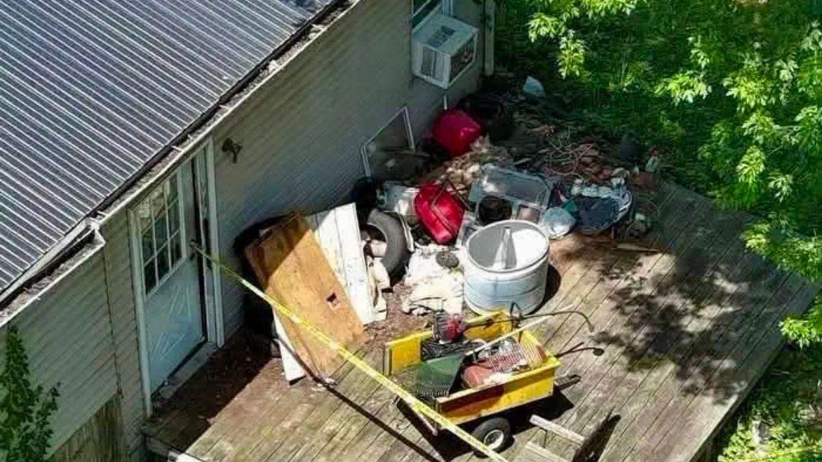 image of Authorities documented rooms overflowing with trash, broken furniture, and debris during the June 30 search.