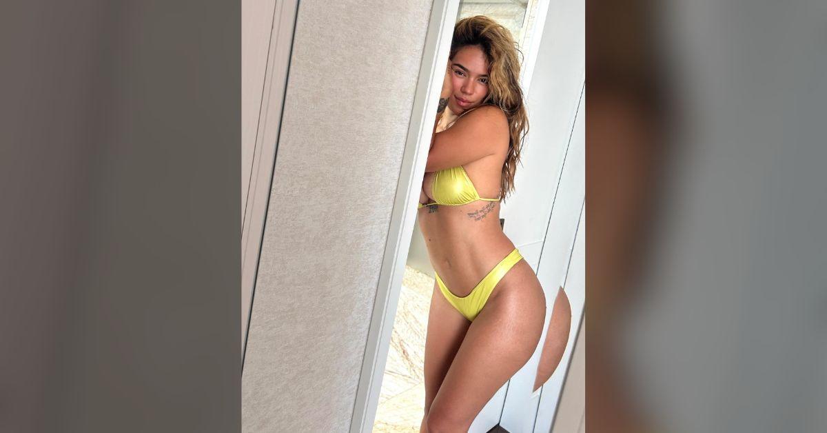 karol g sizzles busty swimsuits vacation boyfriend feid photos