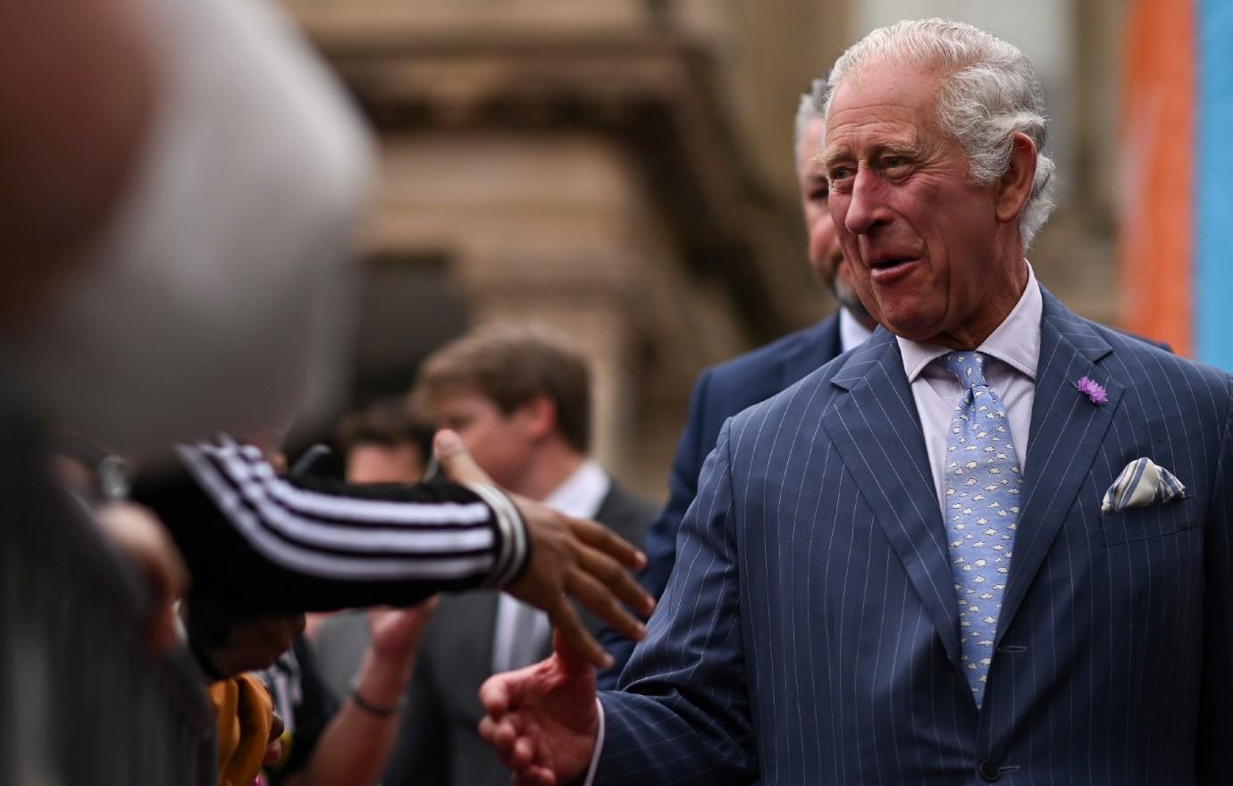 Prince Charles Drives Vintage Car Gassed By Wine & Cheese