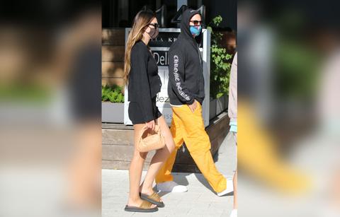 scott disick and girlfriend amelia hamlin color coordinate on beach in miami