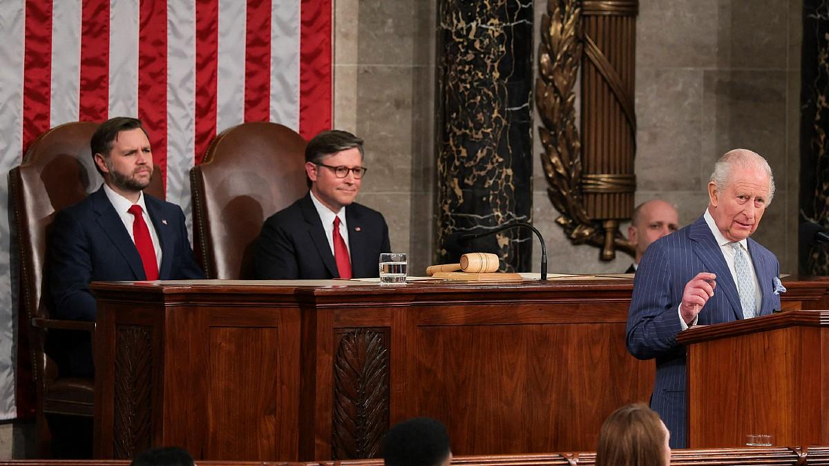 image of J.D. Vance appeared to laugh at the king's jokes. 