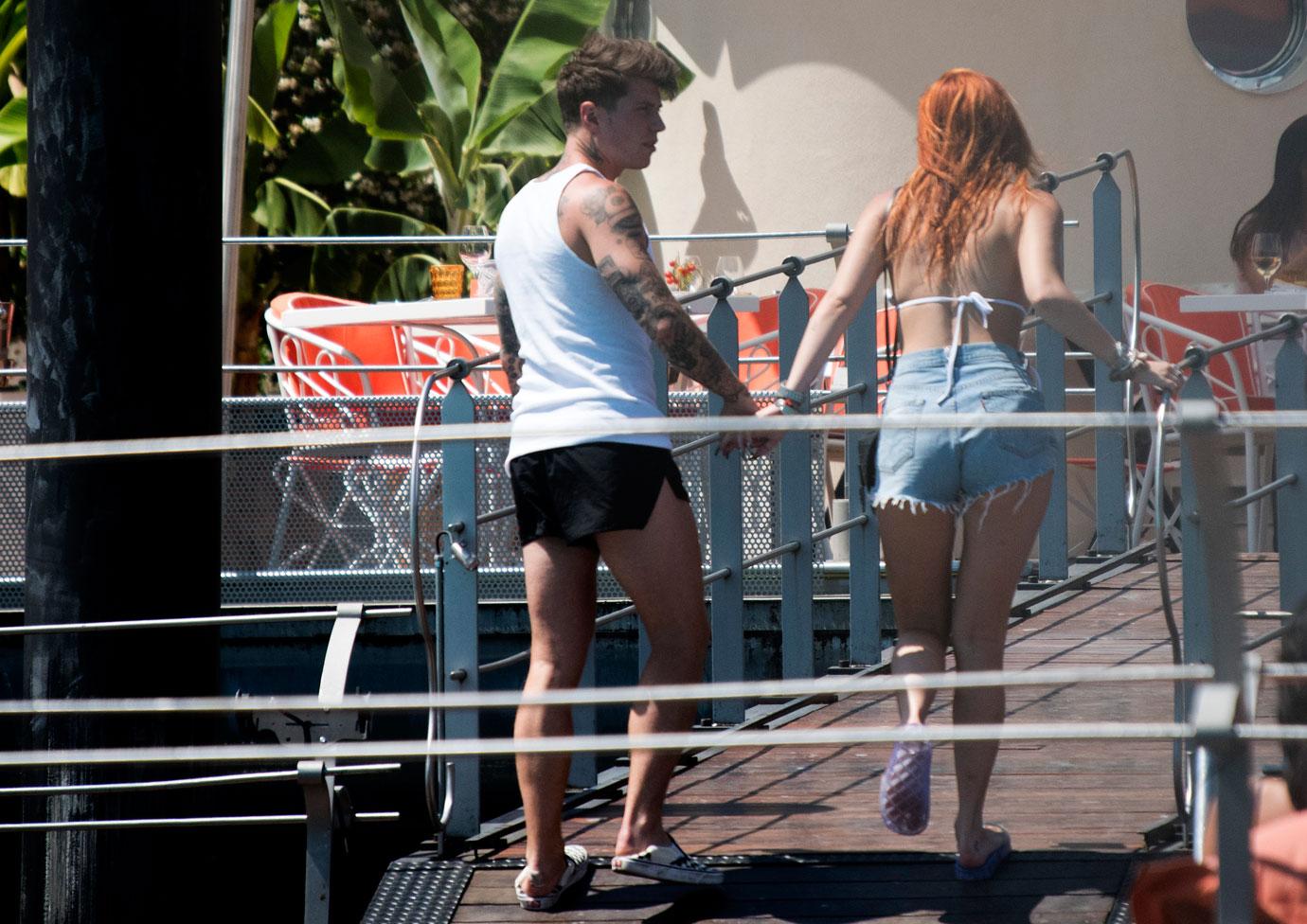 ella thorne and benji mascolo boating on lake como