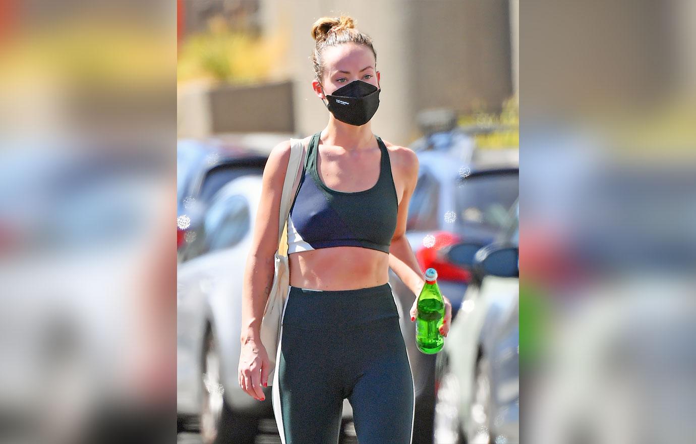 olivia wilde sports bra leggings face mask gym