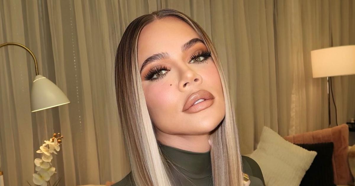 Khloe Kardashian puts her curves on display in a skin-tight bodysuit