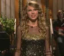 2009__11__taylorbehindscenessnl 225×196.jpg