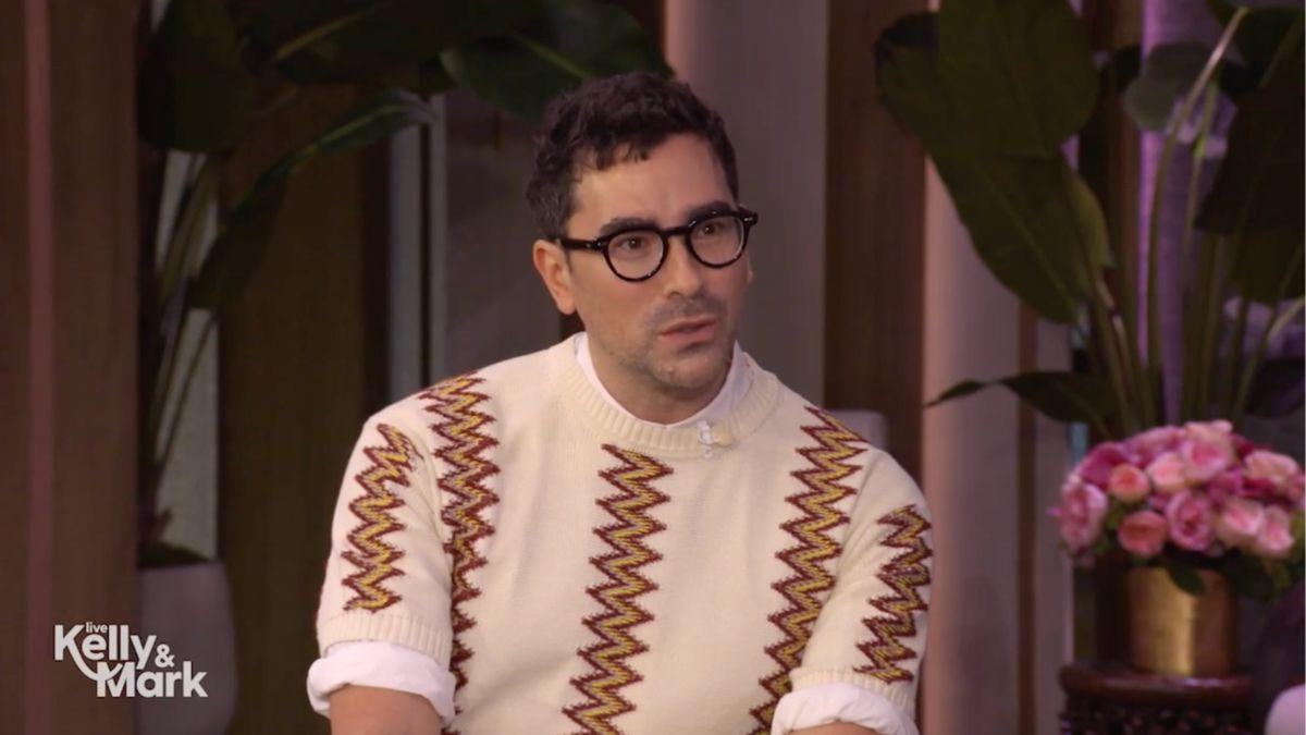 Image of Dan Levy makes sure to talk to every reporter lined up on red carpets.