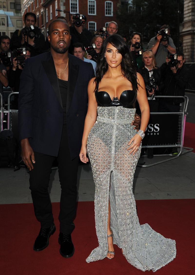 Kim Kardashian and Kanye West arrive for the GQ Awards