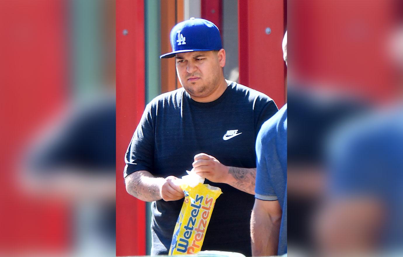 EXCLUSIVE: Rob Kardashian spotted picking up snacks at Wetzels Pretzels in Disneyland