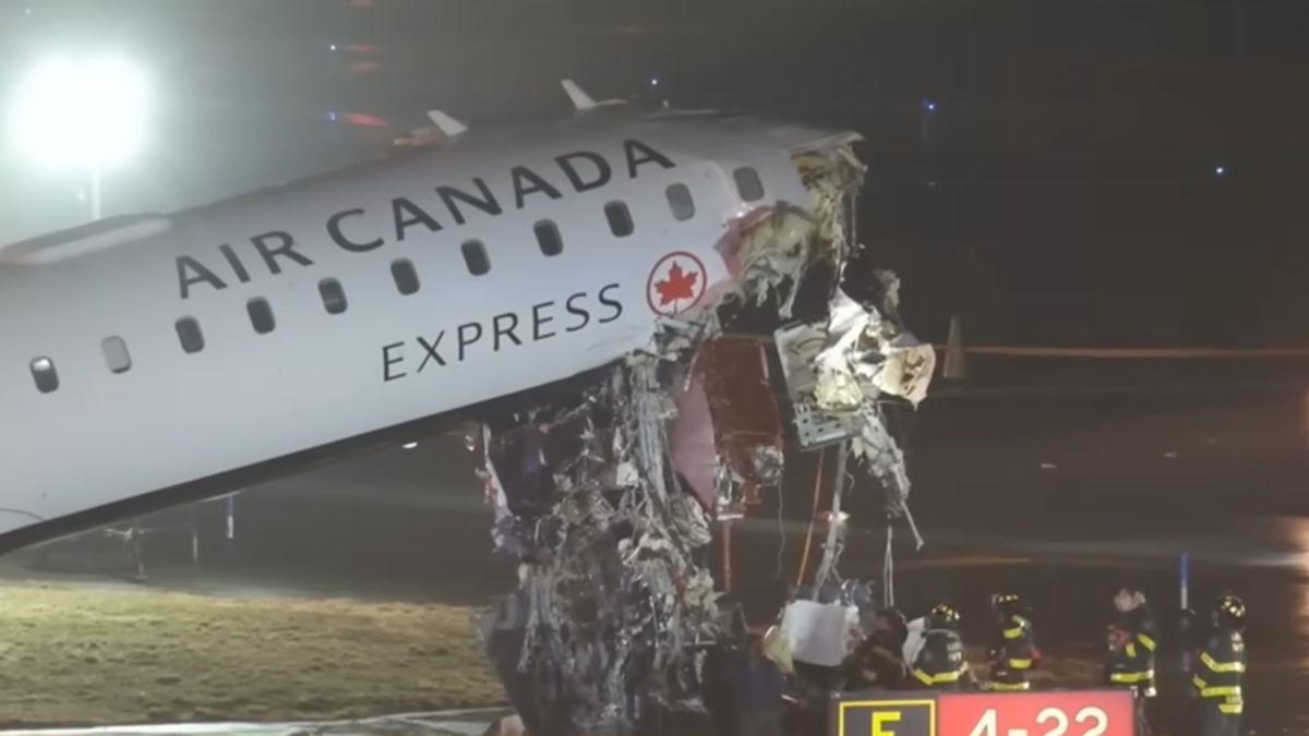 photo of the air canada express flight that collided with a truck at laguardia airport