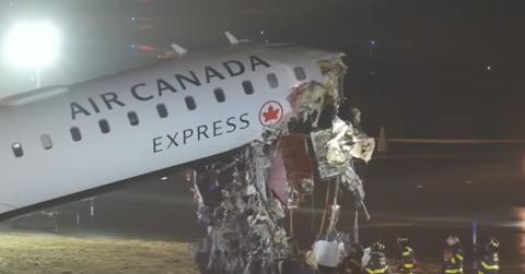 photo of the air canada express flight that collided with a truck at laguardia airport