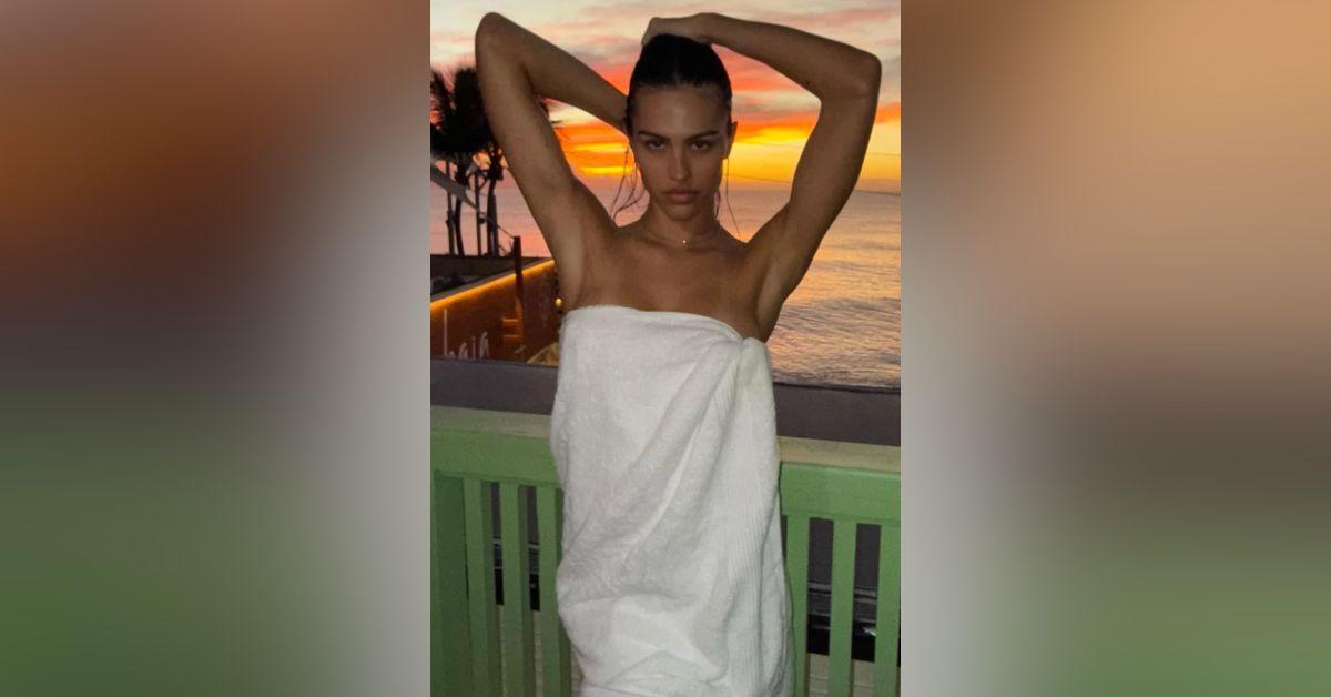 Image of Amelia Gray Hamlin modeled in front of a scenic sunset.