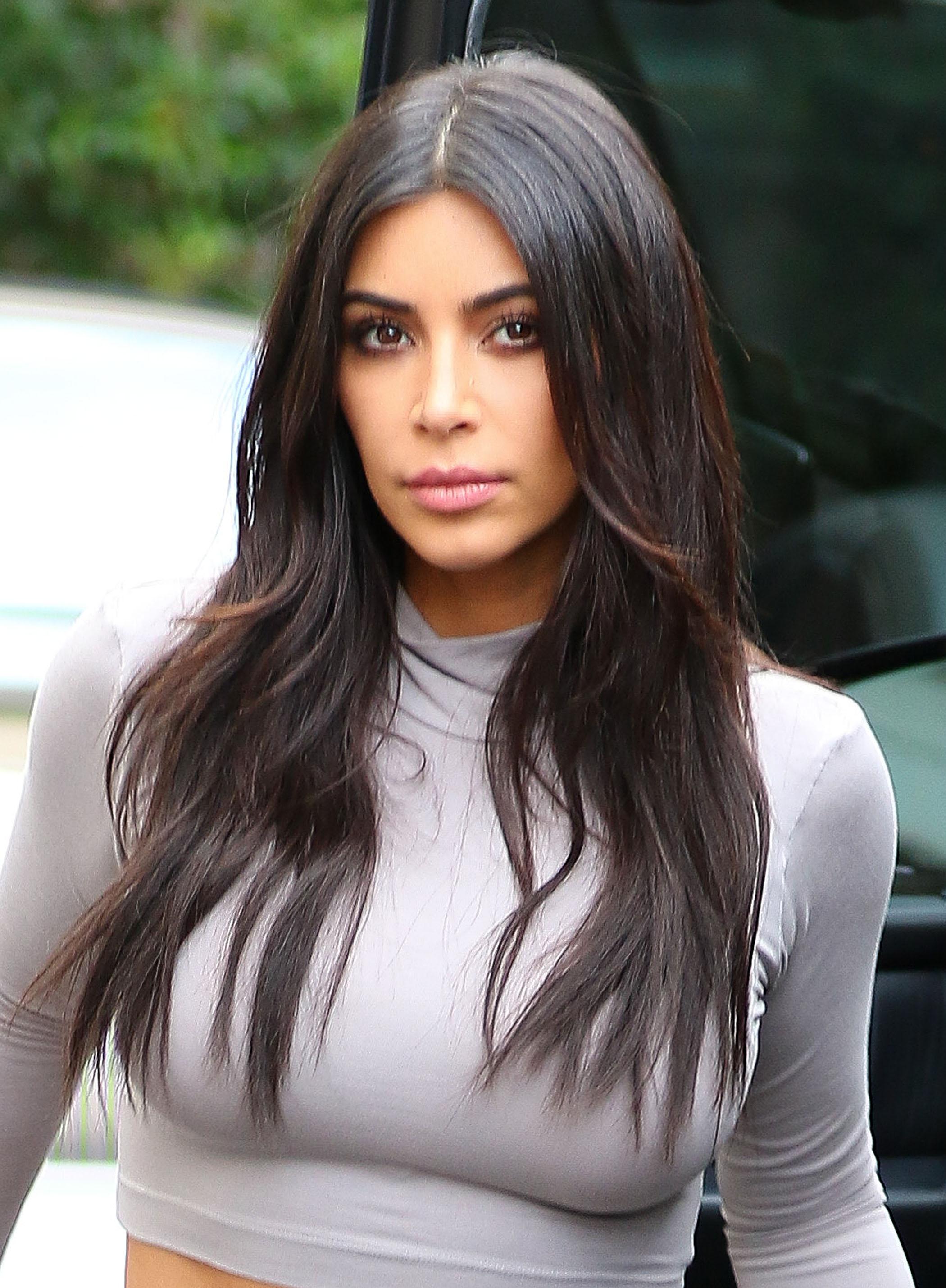 Kim Kardashian explainins why she no longer likes to smile 