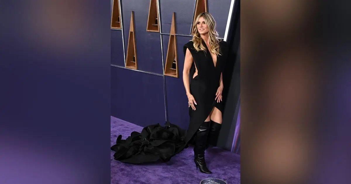 heidi klum awkwardly pretends pants benson boone  amas tripping dress watch