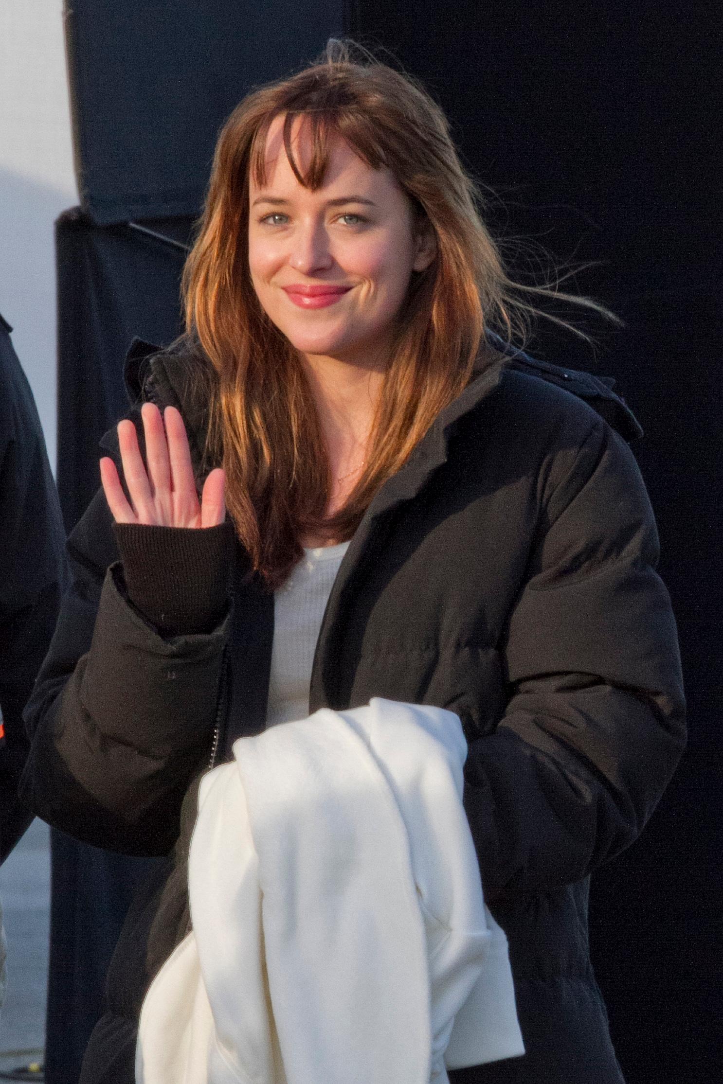 Dakota Johnson all smiles on the set of &#8217;50 Shades of Grey&#8217; in Vancouver, Canada