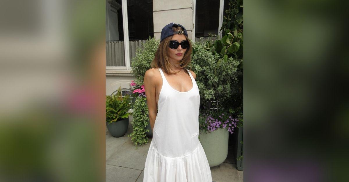 image of Olivia Jade shared a series of Instagram photos wearing a flowing white maxi dress with a plunging neckline during a day out in London.