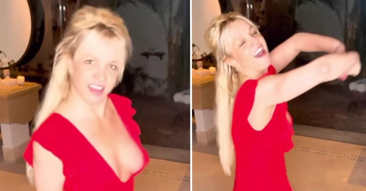 Britney Spears' boobs completely spill out of her tight red dress