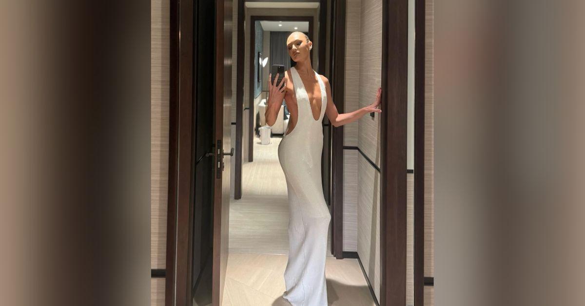 Image of Candice Swanepoel wore a white sequin gown to an event with friends.