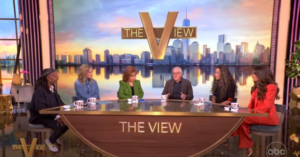 Photo of Robert De Niro, Whoopi Goldberg, Joy Behar, Sunny Hostin, Sara Haines, Alyssa Farah Griffin, and Ana Navarro.