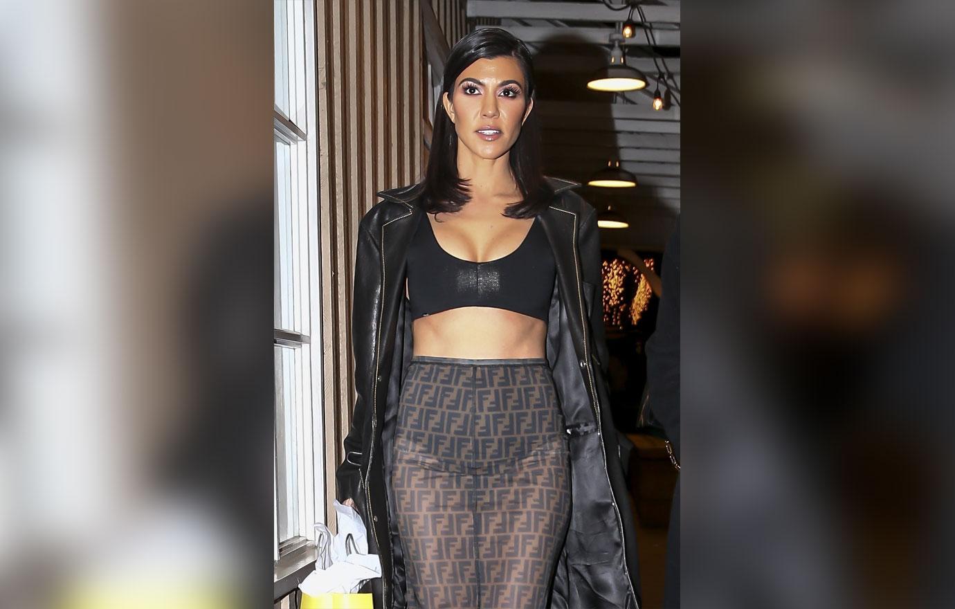 *EXCLUSIVE* Kourtney Kardashian wows in a bra and sheer Fendi skirt look!