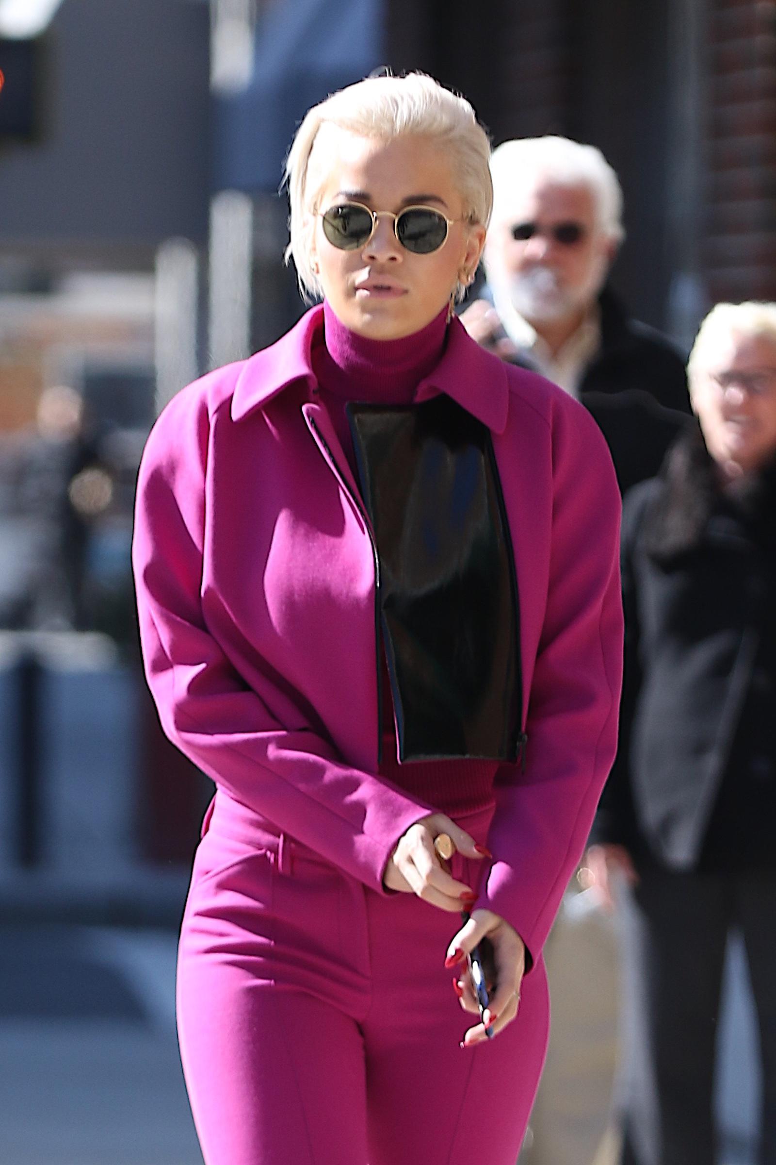 Rita Ora springs out on Monday morning in all pink for radio interviews on a cold Spring morning in NYC