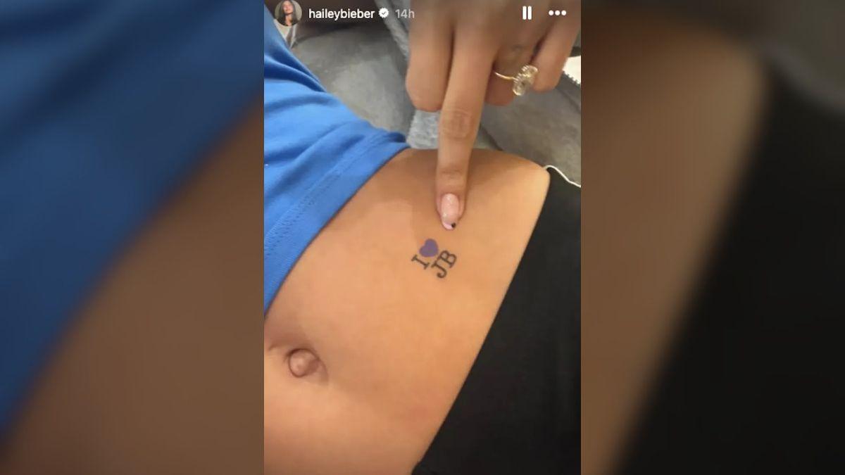 Photo of Hailey Bieber showed off temporary tattoos dedicated to Justin Bieber.