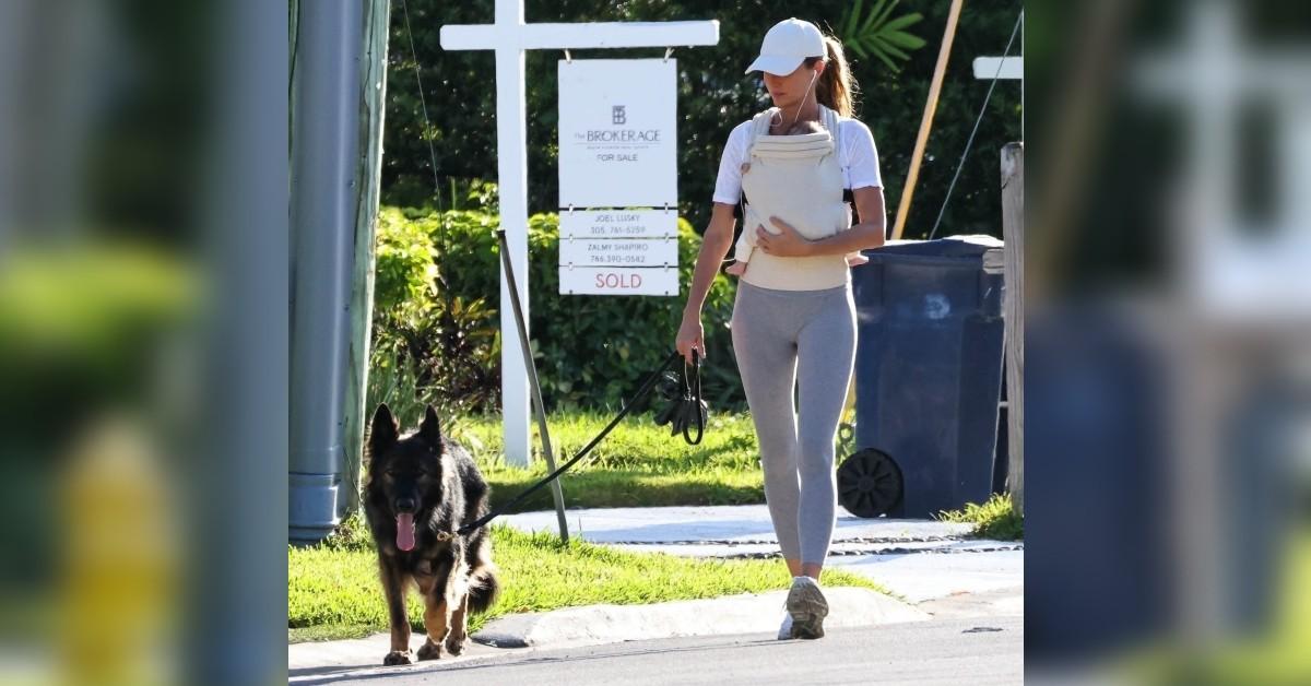 gisele walks baby and dog in miami