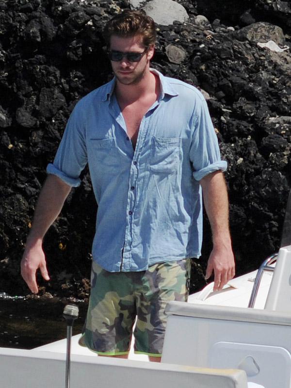 Liam Hemsworth on a boat in Portofino