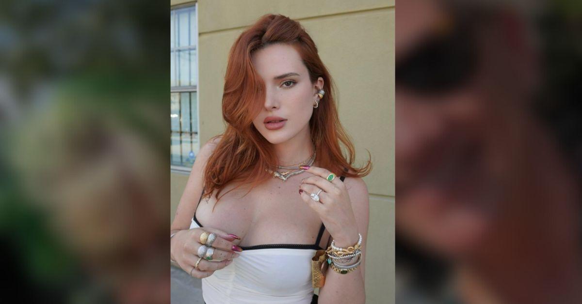 Bella Thorne Exposes Cleavage by Pulling Down Her Top in Risque Photo
