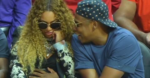 Excited parents Beyonce and Jay Z get distracted by their unborn twins at the LA Clippers game