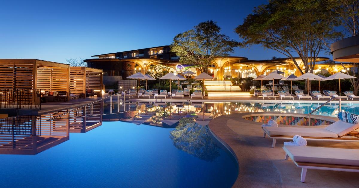 Image of The pool glows at dusk, offering a peaceful place to end the day at W Costa Rica.