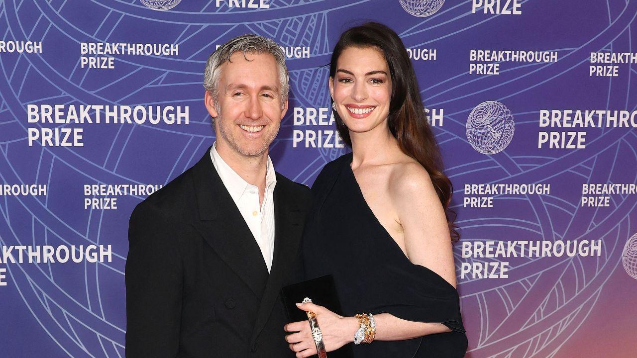 Photo of Anne Hathaway and  Adam Shulman.