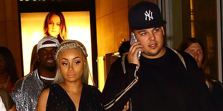 Blac Chyna smiles while leaving her Chymoji launch party with Rob Kardashian