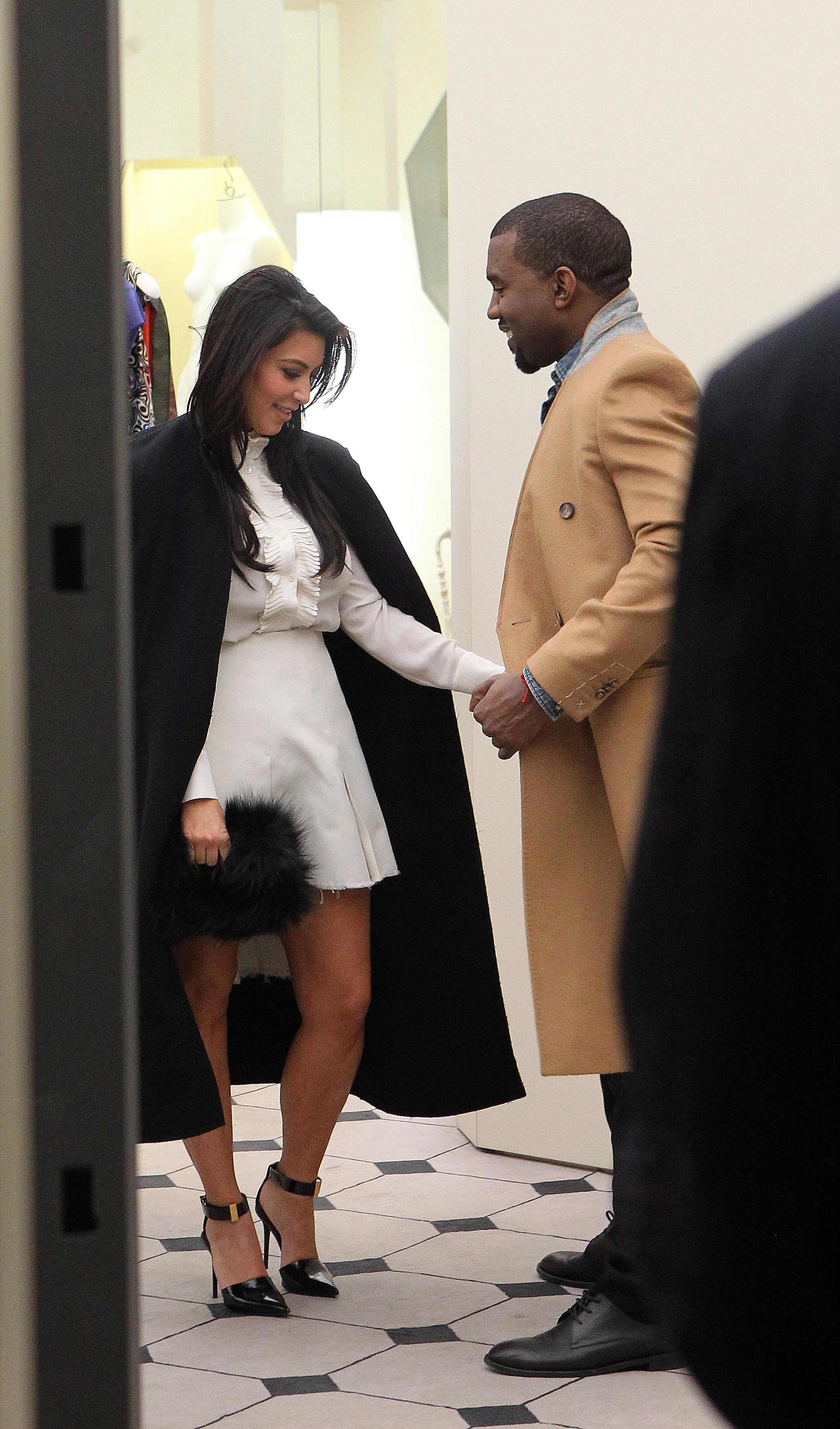 Kim Kardashian and Kanye West shopping at the  Balenciaga shop on Georges V Avenue in Paris?