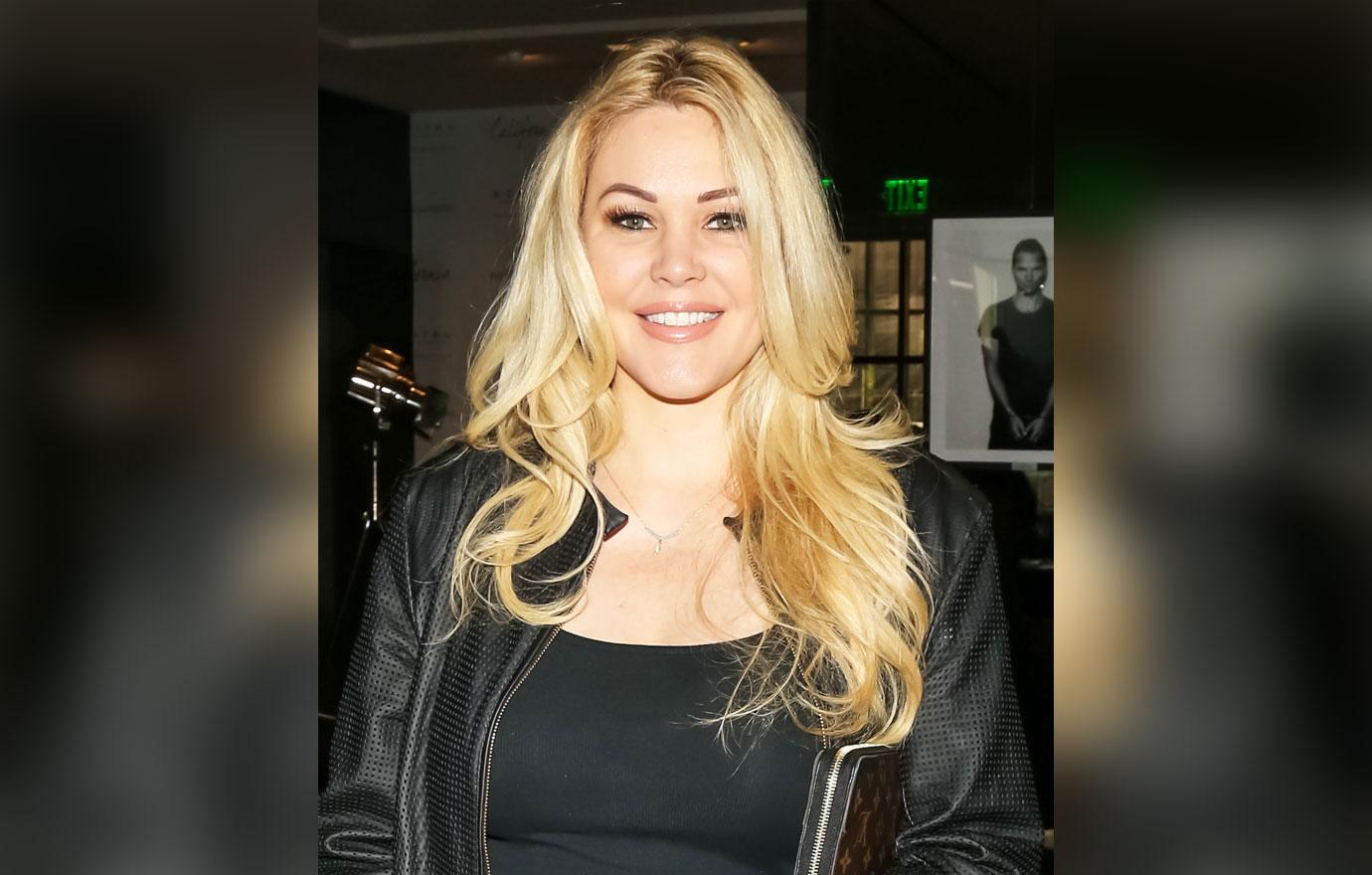 shanna moakler seemingly shades ex travis barker rocker covers tattooed name