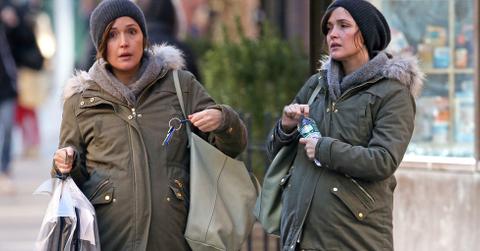 pregnant rose byrne budled up