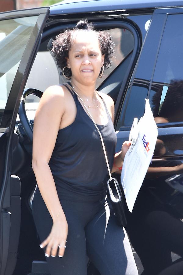 Tia Mowry Goes Without Makeup as she Drops a Package off at the UPS Store