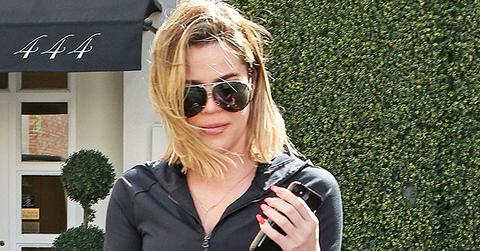 Khloe Kardashian shows off her curves in athleisure as she arrives to Epione
