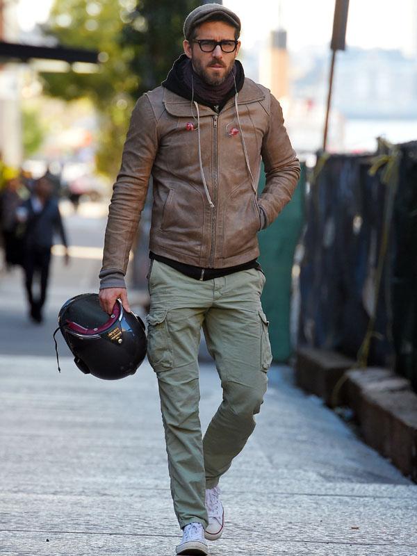 Ryan Reynolds looks cool in a leather jacket as he rides motorcycle in Tribeca, NYC