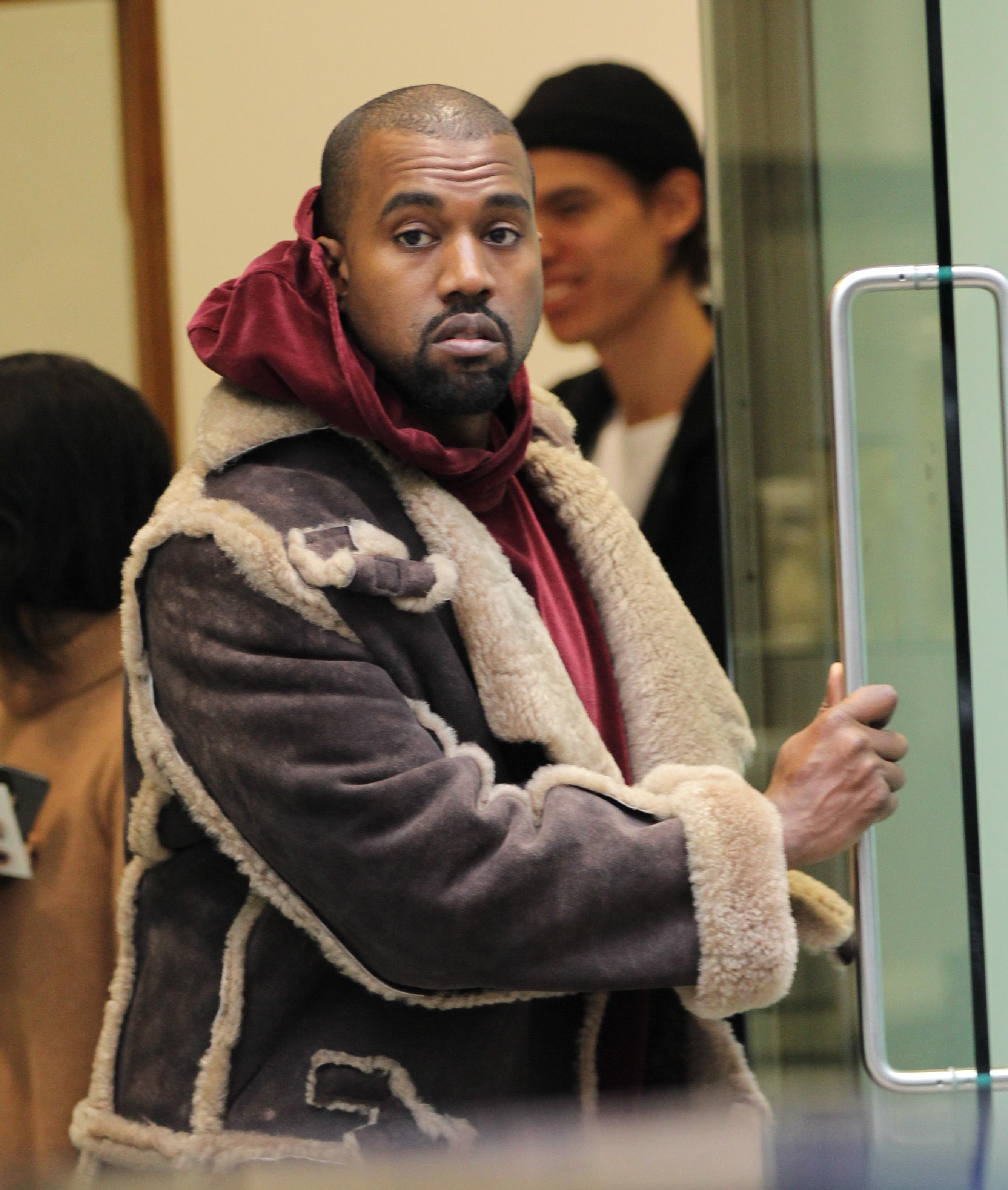 Kanye West pictured leaving the Dover Street Market store, London, UK