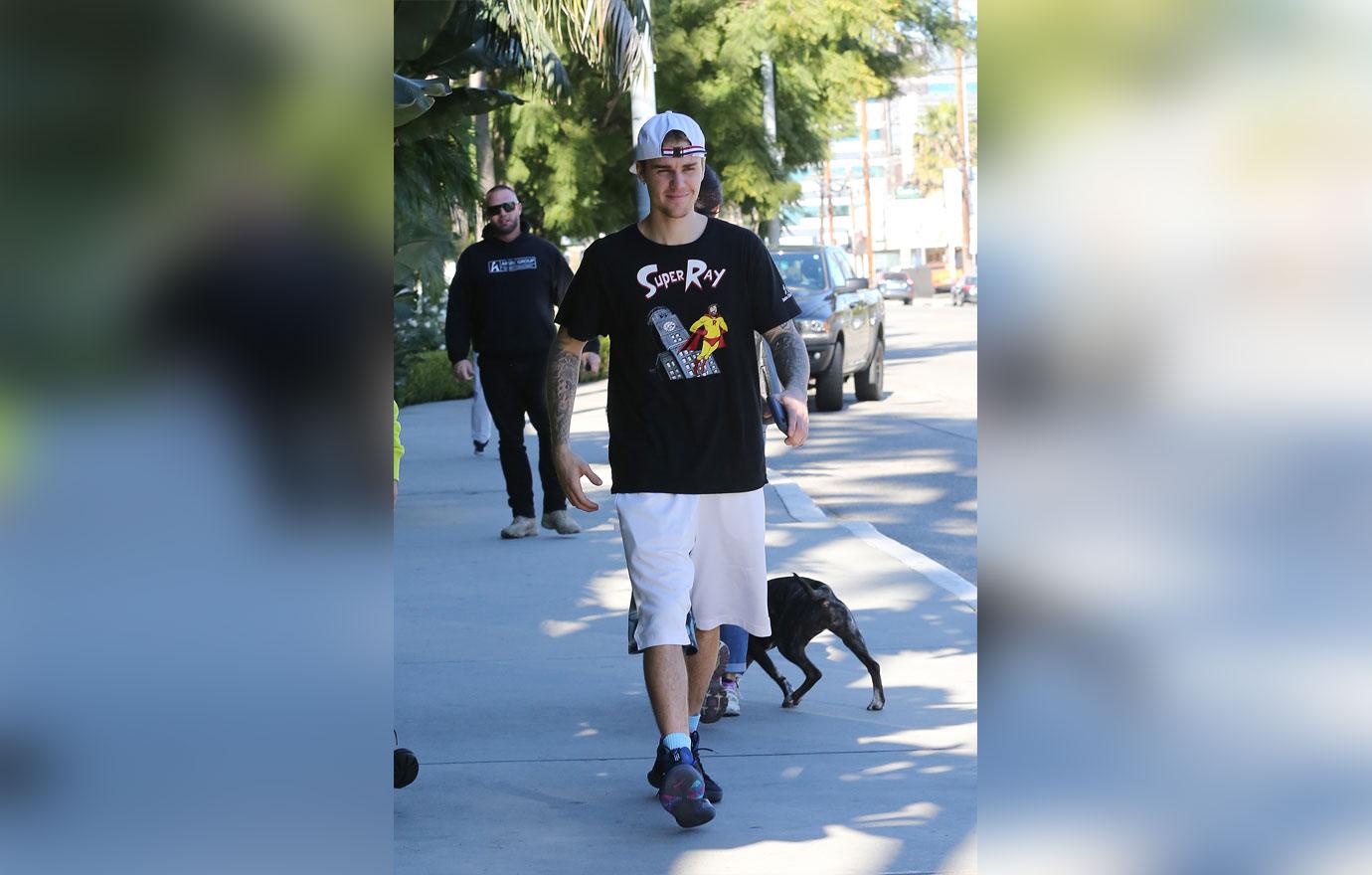 Justin Bieber is all smiles as he leaves the gym