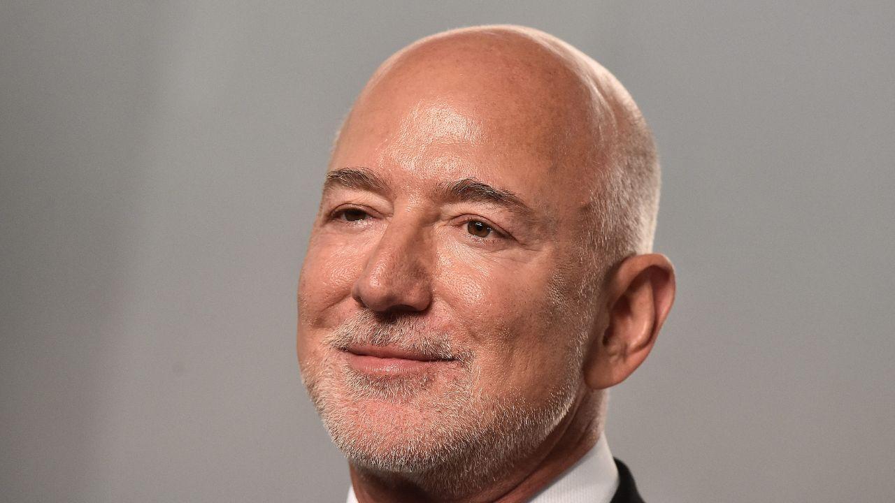 image of Jeff Bezos said the country star 'spent her whole life showing us what it means to lead with love.'