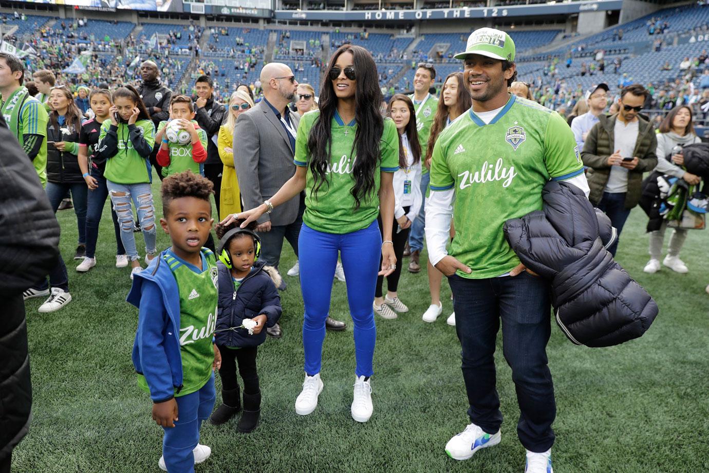 Russell Wilson and Ciara cheering on their Yankees family