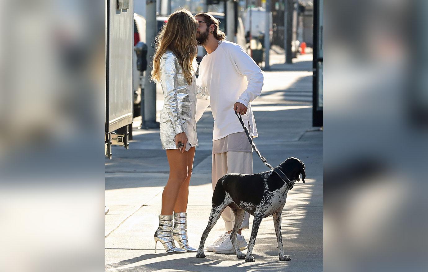 Heidi Klum and her boyfriend  Tom Kaulitz share a kiss while out for a walk in Los Angeles