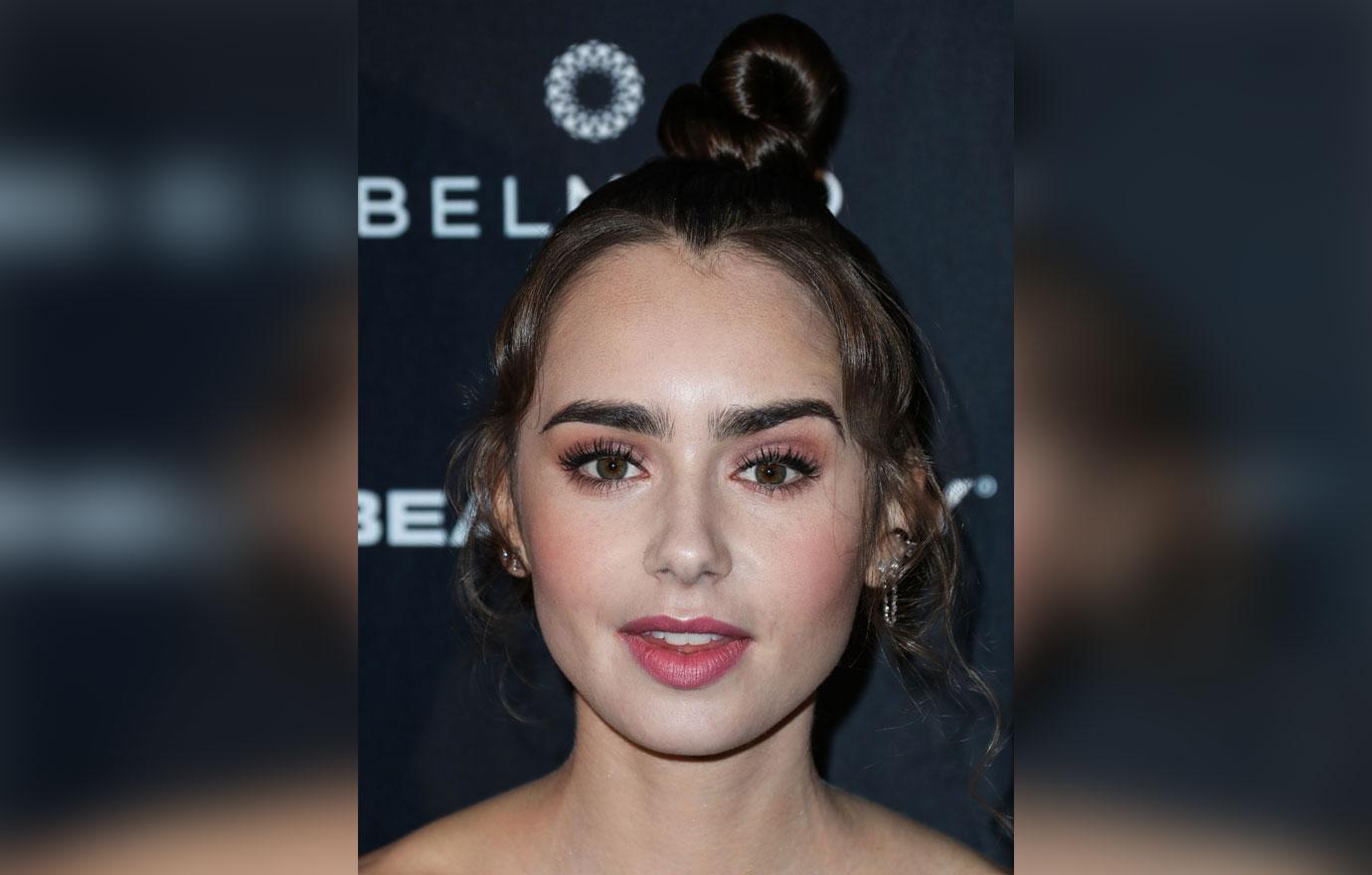 Lily Collins wearing a Giambattista Valli dress arrives at the GO Campaign Gala 2018