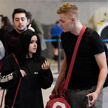 EXCLUSIVE: Ariel Winter and a mystery man depart from Los Angeles