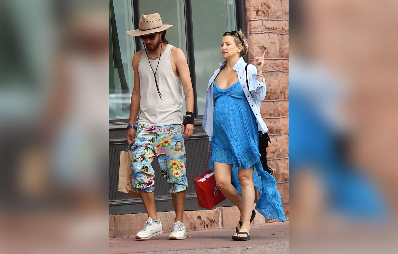 EXCLUSIVE: Kate Hudson shows off her huge baby bump while shopping in Aspen with her boyfriend Danny