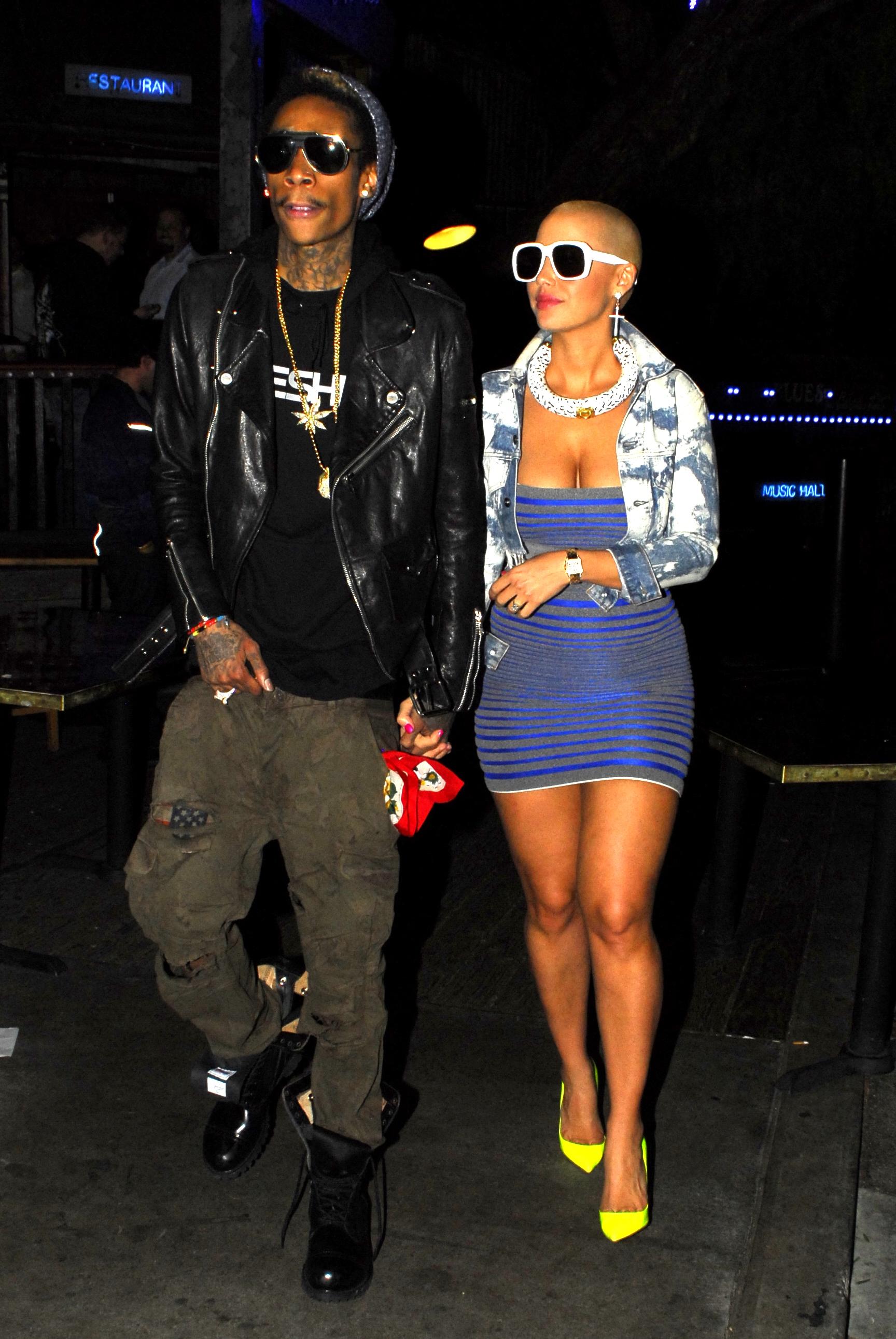 Amber Rose and Wiz Khalifa leave the Guns and Roses show at the House of Blues