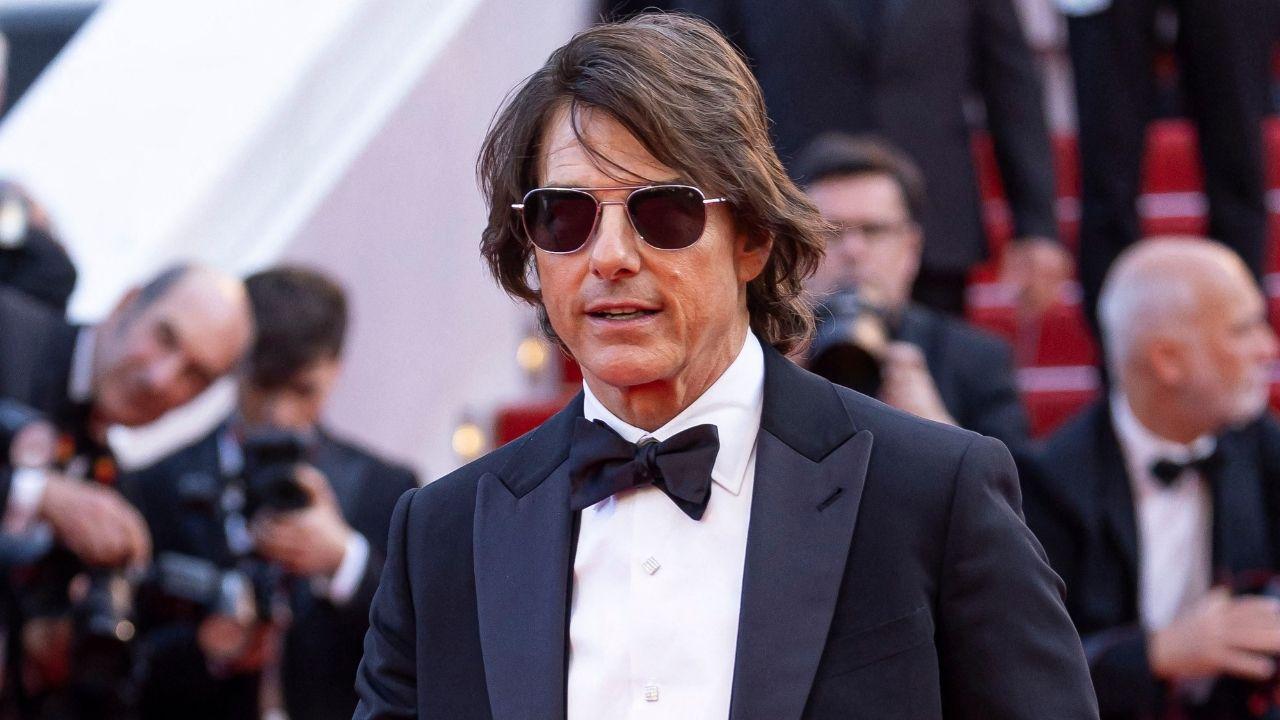 Image of Tom Cruise mingled with NASCAR drivers and fans at Daytona before announcing the 'Days of Thunder' sequel.