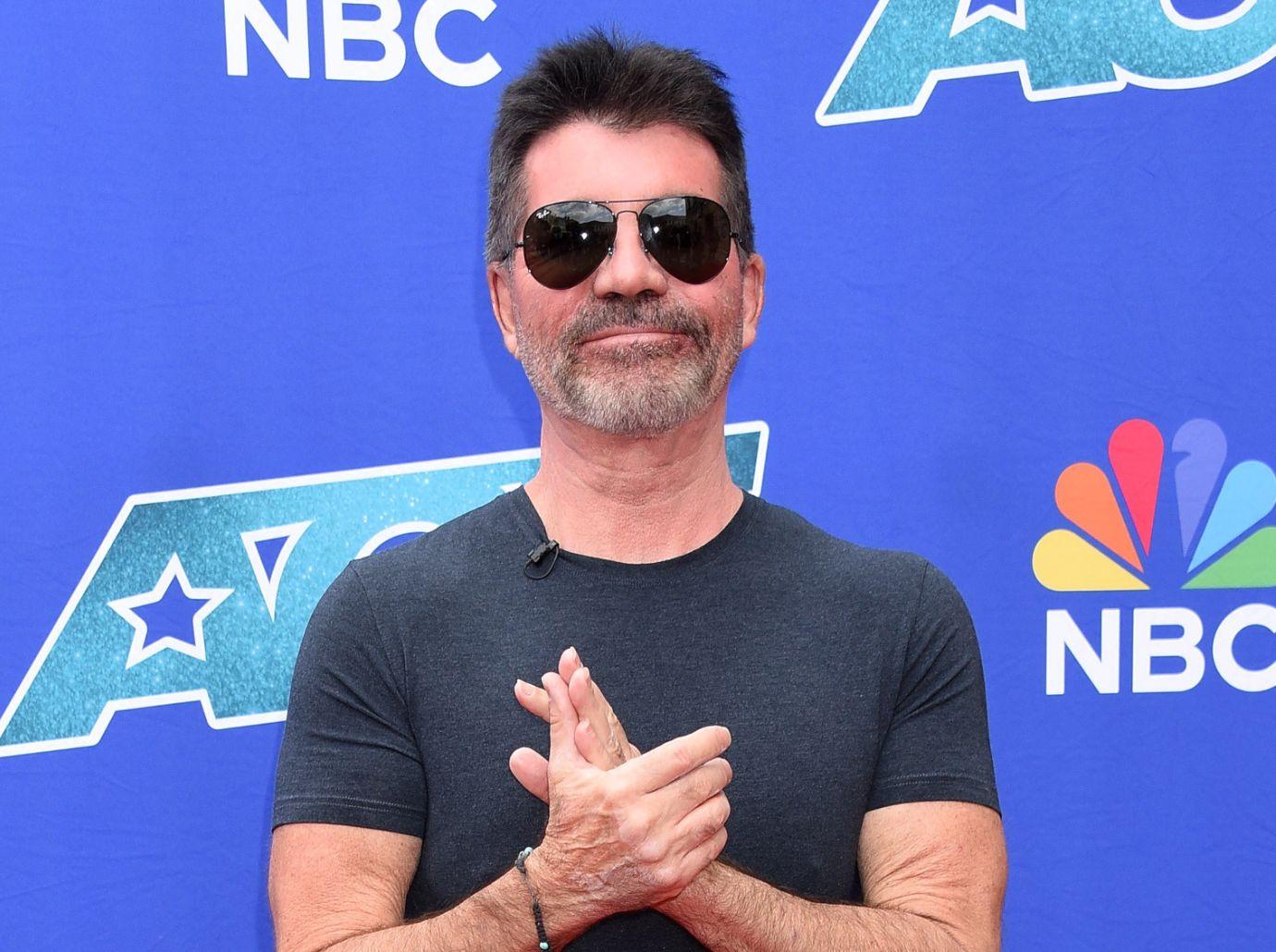 simon cowell admits becoming dad saved him downward spiral